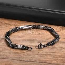 Mørkt rustfri stålarmbånd Adient